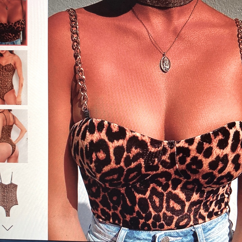 Slim gold chain and leopard bodysuit. Easy snap.
